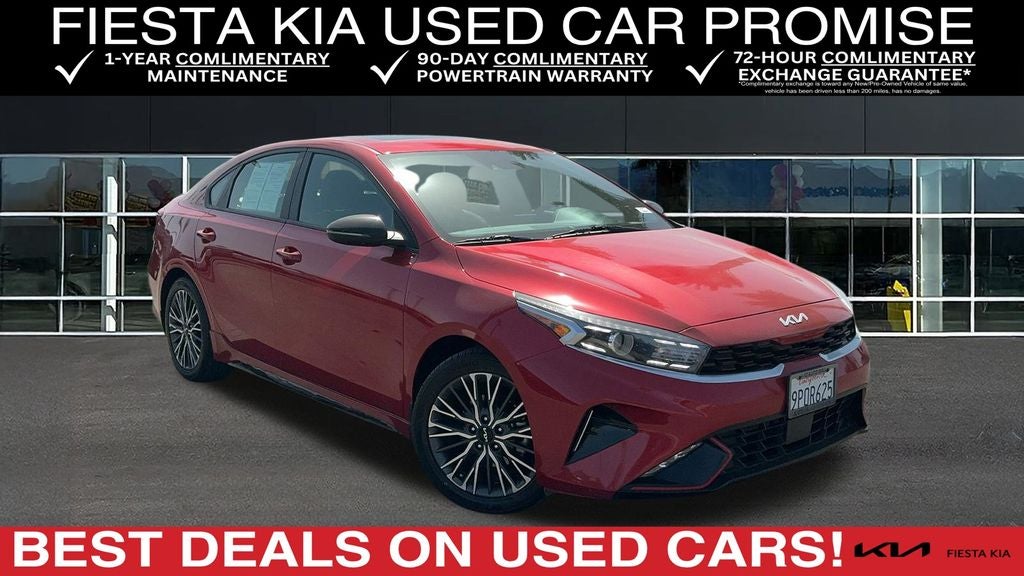 2024 Kia Forte GT-Line in Currant Red — front three-quarter view