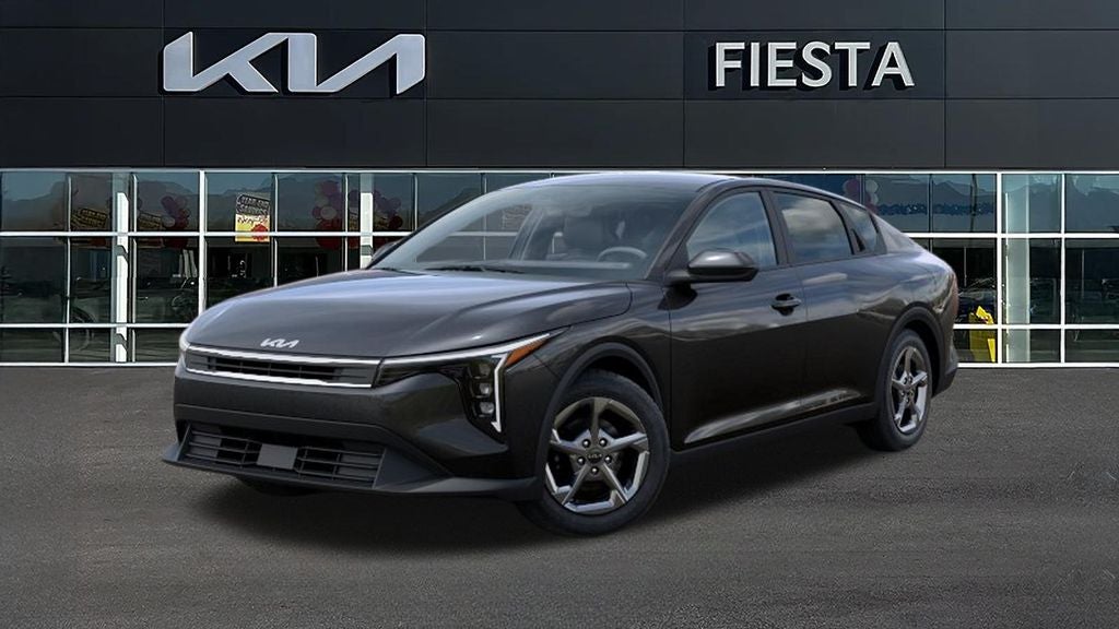 2026 Kia K4 LXS in Gray — front three-quarter view