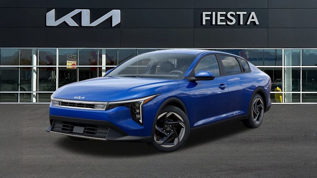 2026 Kia K4 EX in Deep Sea Blue — front three-quarter view