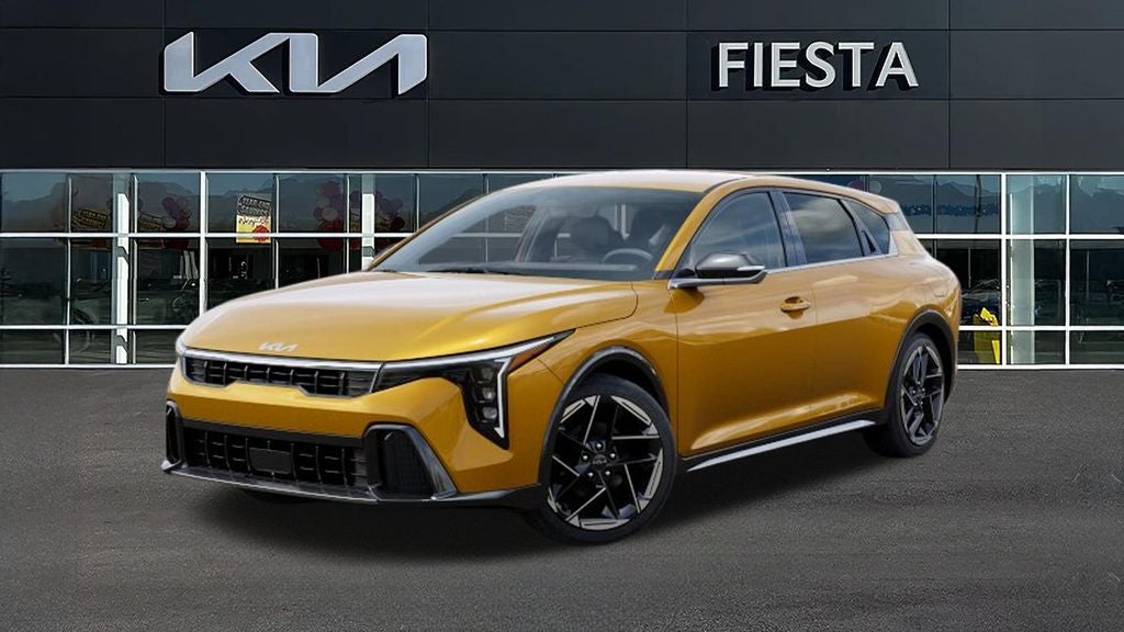 2026 Kia K4 GT-Line in Yellow — front three-quarter view