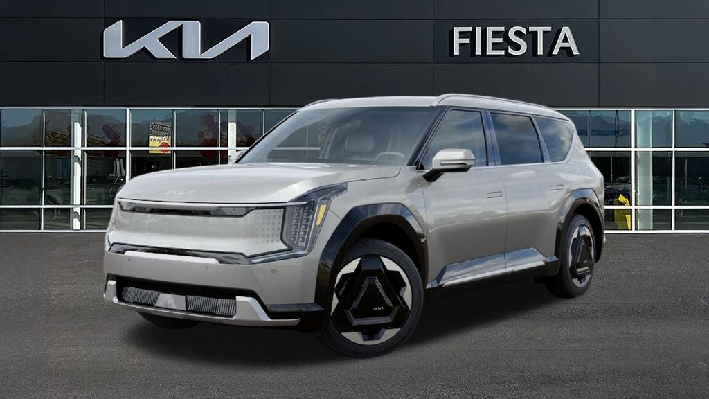 2026 Kia EV9 Land in Ivory Silver — front three-quarter view