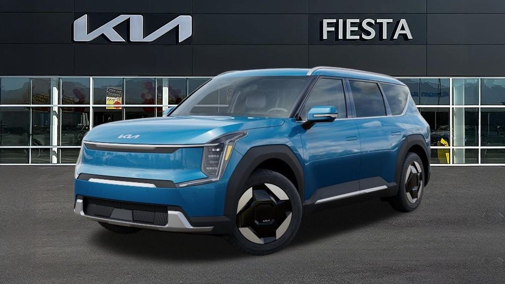 2026 Kia EV9 Wind in Ocean Blue — front three-quarter view