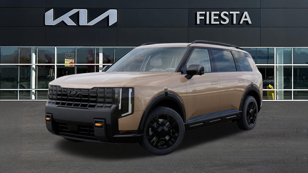 2027 Kia Telluride X-Pro SX-Prestige in Terrain Brown — front three-quarter view