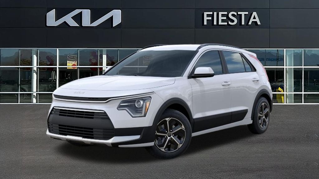 2026 Kia Niro LX in Snow White Pearl — front three-quarter view