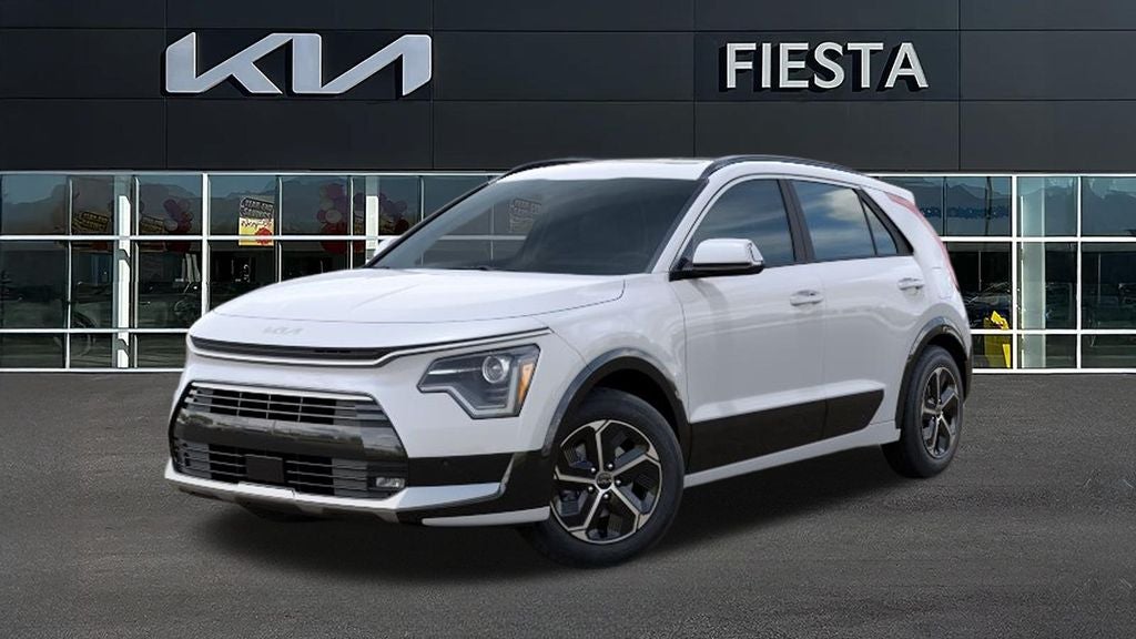 2026 Kia Niro SX in Snow White Pearl — front three-quarter view